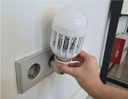 Unscrew standard light bulb